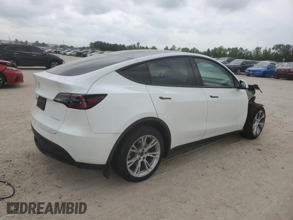 2023 Tesla Model Y Long Range z VIN 7SAYGDEE0PF802511, wystawiony jako Copart lot #54959415 z przebiegiem 12 902 mil mil oraz Szkoda całkowita • Salvage title. Historia ofert i sprzedaży dostępna na DreamBid. Obrazek 3.