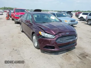 2013 Ford Fusion SE Hybrid z VIN 3FA6P0LU8DR128857, wystawiony jako IAAI lot #42036963 z przebiegiem 128 091 mil mil oraz . Historia ofert i sprzedaży dostępna na DreamBid. Obrazek 1.