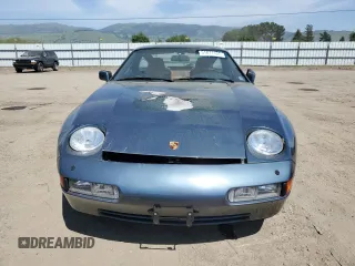 1989 Porsche 928 z VIN WP0JB0925KS860924, wystawiony jako Copart lot #51871105 z przebiegiem Nie podano mil oraz Szkody całkowita. Historia ofert i sprzedaży dostępna na DreamBid. Obrazek 5.