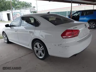 2014 Volkswagen Passat SE w/Sunroof with VIN 1VWBS7A31EC081968, listed as a IAAI auction lot 41963985 with 143,670 mi miles. Bid and sale history available at carsss.com. Image 3.