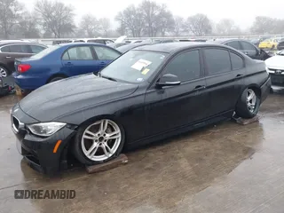 2014 BMW 3 Series 335i with VIN WBA3A9C57EF477662, listed as a IAAI auction lot 41435544 with 129,543 mi miles. Bid and sale history available at carsss.com. Image 6.