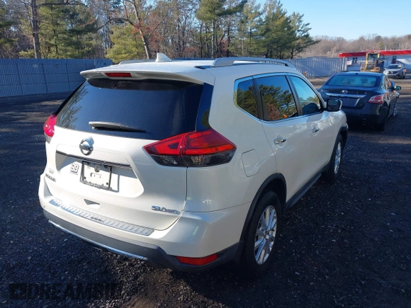 2017 Nissan Rogue SV with VIN 5N1AT2MV2HC843023, listed as a IAAI auction lot 41664836 with 69,946 mi miles and . Bid and sale history available at carsss.com. Image 4.