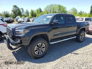 2020 Toyota Tacoma SR5 with VIN 5TFCZ5AN2LX235327, listed as a Copart auction lot 57119125 with 61,730 mi miles and Salvage title. Bid and sale history available at DreamBid. Image 1.