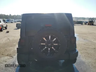 2018 Jeep Wrangler JK Unlimited Sport S with VIN 1C4HJWDG5JL928106, listed as a Copart auction lot 77670184 with 70,228 mi miles and Salvage Title. Bid and sale history available at carsss.com. Image 6.
