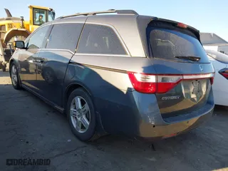 2013 Honda Odyssey Touring with VIN 5FNRL5H9XDB009973, listed as a IAAI auction lot 41904710 with 219,067 mi miles. Bid and sale history available at carsss.com. Image 3.