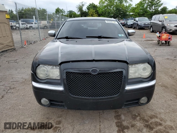 2009 Chrysler 300 z VIN 2C3KK63T39H629020, wystawiony jako Copart lot #65266734 z przebiegiem 175 591 mil mil oraz Szkoda całkowita • Salvage title. Historia ofert i sprzedaży dostępna na DreamBid. Obrazek 5.