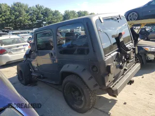 2002 Jeep Wrangler Sport with VIN 1J4FA49S72P715946, listed as a Copart auction lot 70884114 with 114,964 mi miles and Clean Title. Bid and sale history available at carsss.com. Image 2.