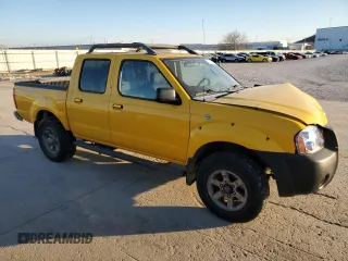 2004 Nissan Frontier XE z VIN 1N6ED27T34C449972, wystawiony jako Copart lot #87205714 z przebiegiem 254 636 mil mil oraz Szkoda całkowita • Salvage title. Historia ofert i sprzedaży dostępna na DreamBid. Obrazek 4.