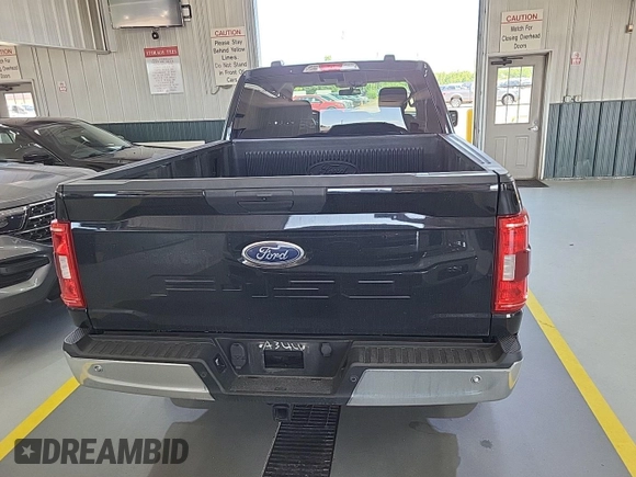 2021 Ford F-150 XL with VIN 1FTFW1E52MFB64744, listed as a IAAI auction lot 42733866 with 98,411 mi miles and . Bid and sale history available at DreamBid. Image 1.