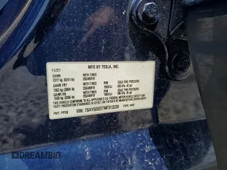 2022 Tesla Model Y Long Range z VIN 7SAYGDEE7NF313228, wystawiony jako Copart lot #55060705 z przebiegiem 32 238 mil mil oraz Szkoda całkowita • Salvage title. Historia ofert i sprzedaży dostępna na DreamBid. Obrazek 13.