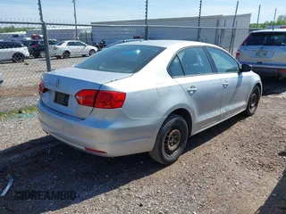 2013 Volkswagen Jetta Sedan S with VIN 3VW2K7AJ2DM412424, listed as a IAAI auction lot 42093728 with 130,688 mi miles. Bid and sale history available at carsss.com. Image 4.