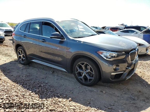 2017 BMW X1 xDrive28i with VIN WBXHT3C32H5F79403, listed as a Copart auction lot 50182775 with 71,003 mi miles and Salvage Title. Bid and sale history available at carsss.com. Image 4.