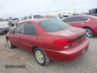 1997 Ford Escort LX with VIN 1FALP13P2VW392173, listed as a IAAI auction lot 41833271 with 123,991 mi miles. Bid and sale history available at carsss.com. Image 3.