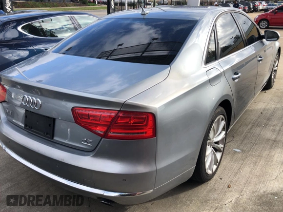 2012 Audi A8 с VIN WAUAVAFD2CN028862, выставлен на аукционе Copart как лот 80295204 с пробегом 162 752 миль миль и Чистый • Clean title. История ставок и продаж доступна на DreamBid. Изображение 4.