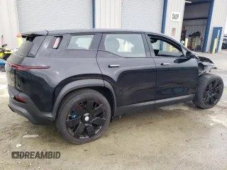 2023 Fisker Ocean One z VIN VCF1ZBU22PG002044, wystawiony jako Copart lot #84522334 z przebiegiem Nie podano mil oraz Szkody całkowita. Historia ofert i sprzedaży dostępna na DreamBid. Obrazek 3.