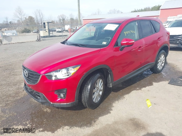 2016 Mazda CX-5 Touring with VIN JM3KE4CY9G0686494, listed as a IAAI auction lot 41822560 with 32,156 mi miles. Bid and sale history available at carsss.com. Image 17.