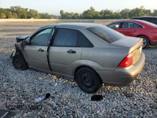 2005 Ford Focus S with VIN 1FAFP34N65W240449, listed as a Copart auction lot 52457395 with 140,246 mi miles and Non Repairable. Bid and sale history available at DreamBid. Image 2.