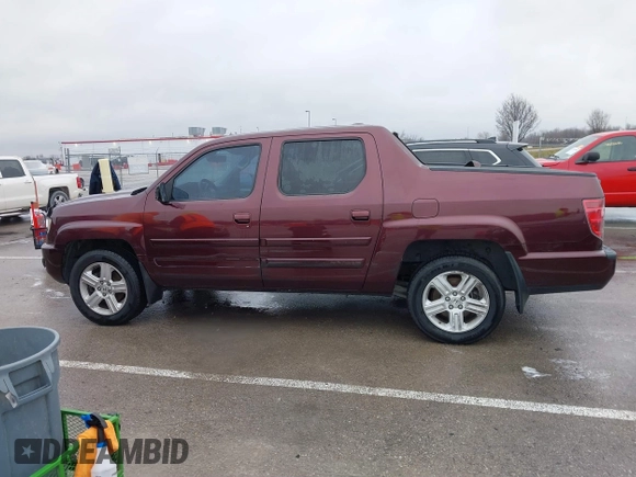 2009 Honda Ridgeline RTL with VIN 5FPYK16529B100032, listed as a IAAI auction lot 41206781 with 130,694 mi miles and . Bid and sale history available at DreamBid. Image 14.