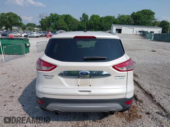 2015 Ford Escape Titanium with VIN 1FMCU0JXXFUA07175, listed as a IAAI auction lot 42447067 with 94,893 mi miles and . Bid and sale history available at DreamBid. Image 16.