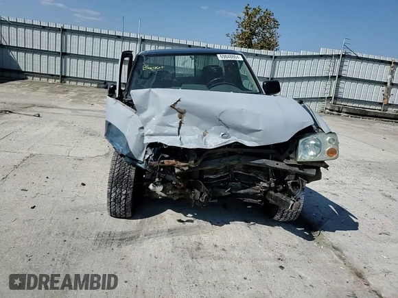 2003 Nissan Frontier XE with VIN 1N6ED26Y03C462996, listed as a Copart auction lot 69848804 with Not provided miles and Salvage title. Bid and sale history available at DreamBid. Image 10.