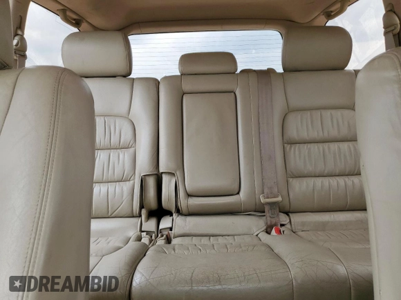 2003 Lexus LX 470 z VIN JTJHT00W033530306, wystawiony jako Copart lot #57162675 z przebiegiem 185 458 mil mil oraz Szkoda całkowita • Salvage title. Historia ofert i sprzedaży dostępna na DreamBid. Obrazek 10.