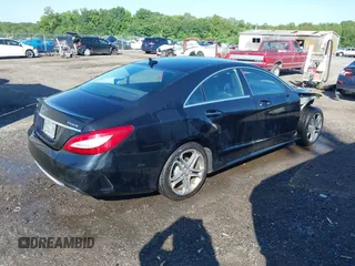 2015 Mercedes-Benz CLS 400 with VIN WDDLJ6HB3FA153077, listed as a IAAI auction lot 42537583 with 56,404 mi miles and . Bid and sale history available at DreamBid. Image 4.