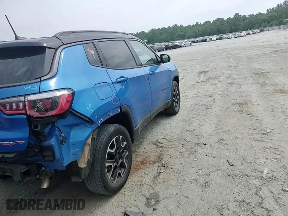 2020 Jeep Compass Trailhawk z VIN 3C4NJDDB7LT221575, wystawiony jako Copart lot #57414255 z przebiegiem 69 159 mil mil oraz Szkoda całkowita • Salvage title. Historia ofert i sprzedaży dostępna na DreamBid. Obrazek 13.