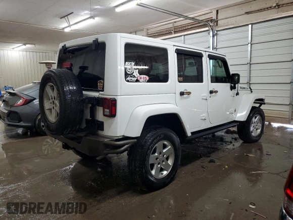 2017 Jeep Wrangler Unlimited Rubicon Recon with VIN 1C4HJWFG9HL543266, listed as a Copart auction lot 87771705 with 50,223 mi miles and Salvage title. Bid and sale history available at DreamBid. Image 3.