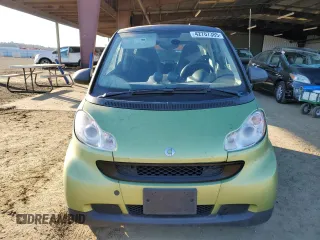 2012 Smart fortwo Pure z VIN WMEEJ3BA7CK543415, wystawiony jako Copart lot #42707385 z przebiegiem 76 280 mil mil oraz Szkody całkowita. Historia ofert i sprzedaży dostępna na DreamBid. Obrazek 5.