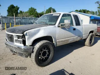 1996 GMC Sierra 1500 z VIN 2GTEK19R1T1555006, wystawiony jako Copart lot #56482035 z przebiegiem 125 664 mil mil oraz Szkoda całkowita • Salvage title. Historia ofert i sprzedaży dostępna na DreamBid. Obrazek 1.