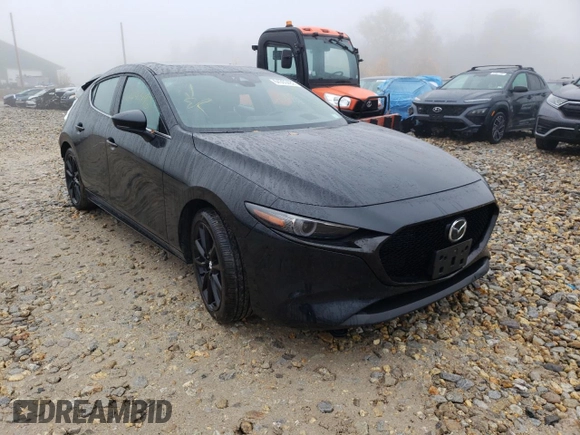 2021 Mazda Mazda3 Hatchback Premium with VIN JM1BPBML4M1402317, listed as a Copart auction lot 64393482 with 8,016 mi miles. Bid and sale history available at carsss.com. Image 1.