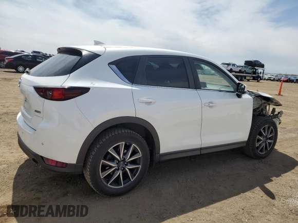 2018 Mazda CX-5 Touring with VIN JM3KFBCM0J0431285, listed as a Copart auction lot 53919695 with 61,745 mi miles and Salvage Title. Bid and sale history available at carsss.com. Image 3.