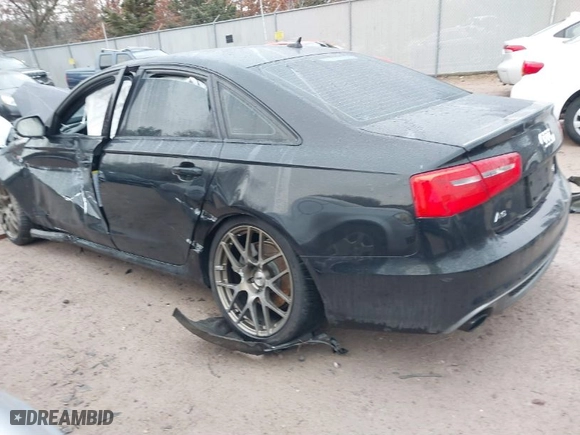 2014 Audi A6 3.0T Prestige with VIN WAUHGAFC7EN148367, listed as a IAAI auction lot 41084043 with 103,546 mi miles. Bid and sale history available at carsss.com. Image 3.