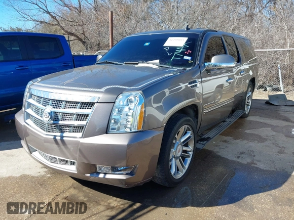 2011 Cadillac Escalade ESV Platinum Edition z VIN 1GYS4KEFXBR253776, wystawiony jako IAAI lot #41292093 z przebiegiem 290 220 mil mil oraz . Historia ofert i sprzedaży dostępna na DreamBid. Obrazek 17.