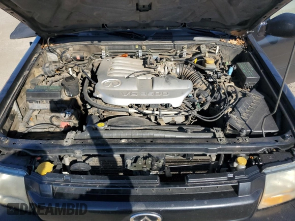 2002 Infiniti QX4 with VIN JNRDR09X92W210247, listed as a Copart auction lot 84913164 with 160,938 mi miles and Salvage Title. Bid and sale history available at DreamBid. Image 12.