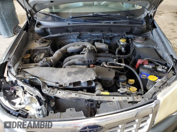 2011 Subaru Forester X z VIN JF2SHABC7BH732386, wystawiony jako Copart lot #55149135 z przebiegiem 191 898 mil mil oraz Szkoda całkowita • Salvage title. Historia ofert i sprzedaży dostępna na DreamBid. Obrazek 11.