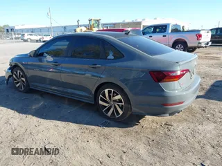 2019 Volkswagen Jetta GLI S z VIN 3VW6T7BU5KM169132, wystawiony jako IAAI lot #41599605 z przebiegiem 59 744 mil mil oraz . Historia ofert i sprzedaży dostępna na DreamBid. Obrazek 3.