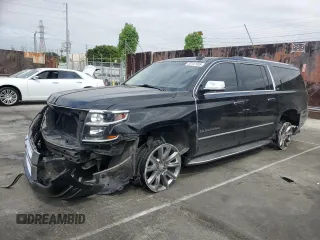 2015 Chevrolet Suburban LTZ with VIN 1GNSCKKC3FR636779, listed as a Copart auction lot 53141955 with 117,581 mi miles and Salvage title. Bid and sale history available at DreamBid. Image 1.