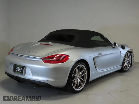 2014 Porsche Boxster with VIN WP0CA2A83ES120705, listed as a Copart auction lot 48166935 with 65,603 mi miles and Salvage title. Bid and sale history available at DreamBid. Image 3.