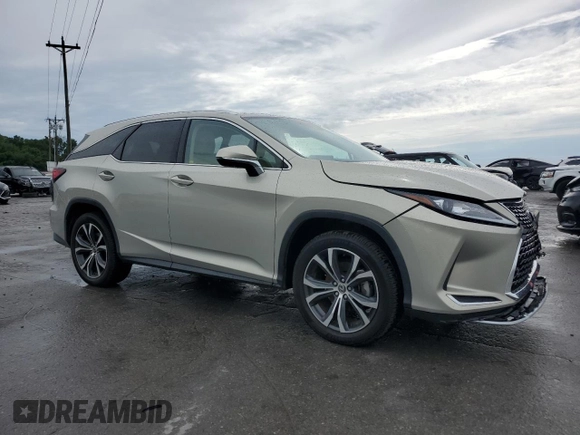 2020 Lexus RX 350L with VIN JTJHZKEA8L2017253, listed as a Copart auction lot 60213465 with 62,422 mi miles and Salvage title. Bid and sale history available at DreamBid. Image 4.