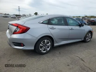 2017 Honda Civic LX z VIN 2HGFC2F52HH551152, wystawiony jako Copart lot #52728275 z przebiegiem 64 376 mil mil oraz Szkoda całkowita • Salvage title. Historia ofert i sprzedaży dostępna na DreamBid. Obrazek 3.