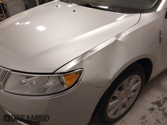 2012 Lincoln MKZ with VIN 3LNHL2JC6CR832702, listed as a IAAI auction lot 41977883 with 159,760 mi miles. Bid and sale history available at carsss.com. Image 12.
