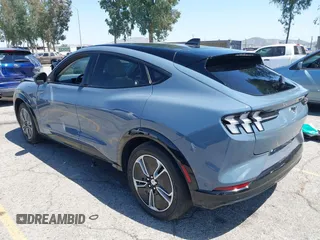 2023 Ford Mustang Mach-E Premium z VIN 3FMTK3R47PMA60861, wystawiony jako IAAI lot #42311615 z przebiegiem 27 469 mil mil oraz . Historia ofert i sprzedaży dostępna na DreamBid. Obrazek 3.