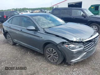 2019 Volkswagen Jetta SEL z VIN 3VWE57BU6KM009492, wystawiony jako IAAI lot #42104094 z przebiegiem 137 087 mil mil oraz . Historia ofert i sprzedaży dostępna na DreamBid. Obrazek 1.