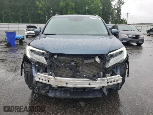 2022 Honda Pilot Touring 7-Passenger z VIN 5FNYF5H63NB015091, wystawiony jako Copart lot #56323725 z przebiegiem 28 614 mil mil oraz Szkoda całkowita • Salvage title. Historia ofert i sprzedaży dostępna na DreamBid. Obrazek 5.