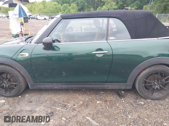 2016 MINI Convertible with VIN WMWWG5C51G3C19231, listed as a IAAI auction lot 42246342 with 93,576 mi miles and . Bid and sale history available at DreamBid. Image 14.