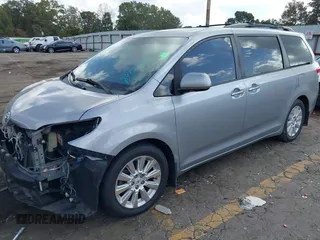 2011 Toyota Sienna XLE AAS with VIN 5TDYK3DC8BS157794, listed as a IAAI auction lot 40759823 with 211,716 mi miles and . Bid and sale history available at DreamBid. Image 17.