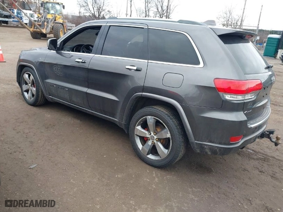 2014 Jeep Grand Cherokee Overland with VIN 1C4RJFCGXEC172008, listed as a IAAI auction lot 41719313 with 164,682 mi miles. Bid and sale history available at carsss.com. Image 3.