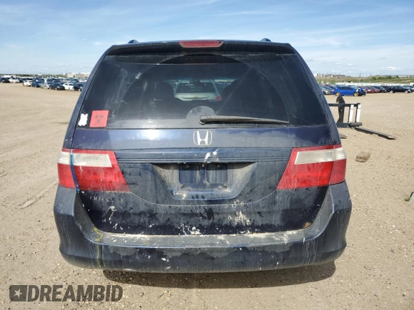 2006 Honda Odyssey EX-L z VIN 5FNRL38706B128265, wystawiony jako Copart lot #58715415 z przebiegiem 377 656 mil mil oraz Szkoda całkowita • Salvage title. Historia ofert i sprzedaży dostępna na DreamBid. Obrazek 6.