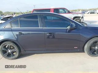 2014 Chevrolet Cruze 2LT z VIN 1G1PE5SB3E7255292, wystawiony jako IAAI lot #41851205 z przebiegiem 141 659 mil mil oraz . Historia ofert i sprzedaży dostępna na DreamBid. Obrazek 13.